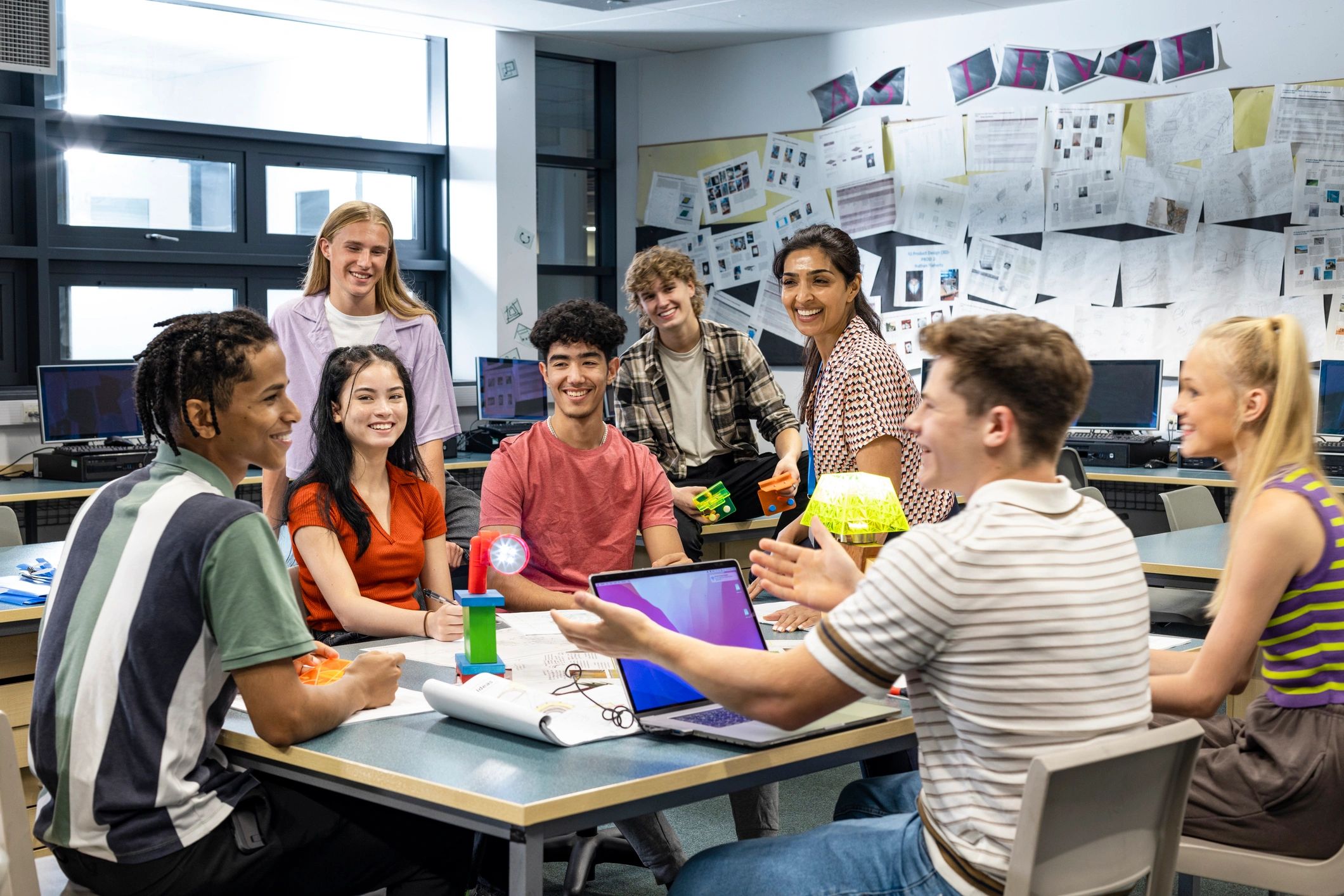 Students and teacher in a classroom discussion
