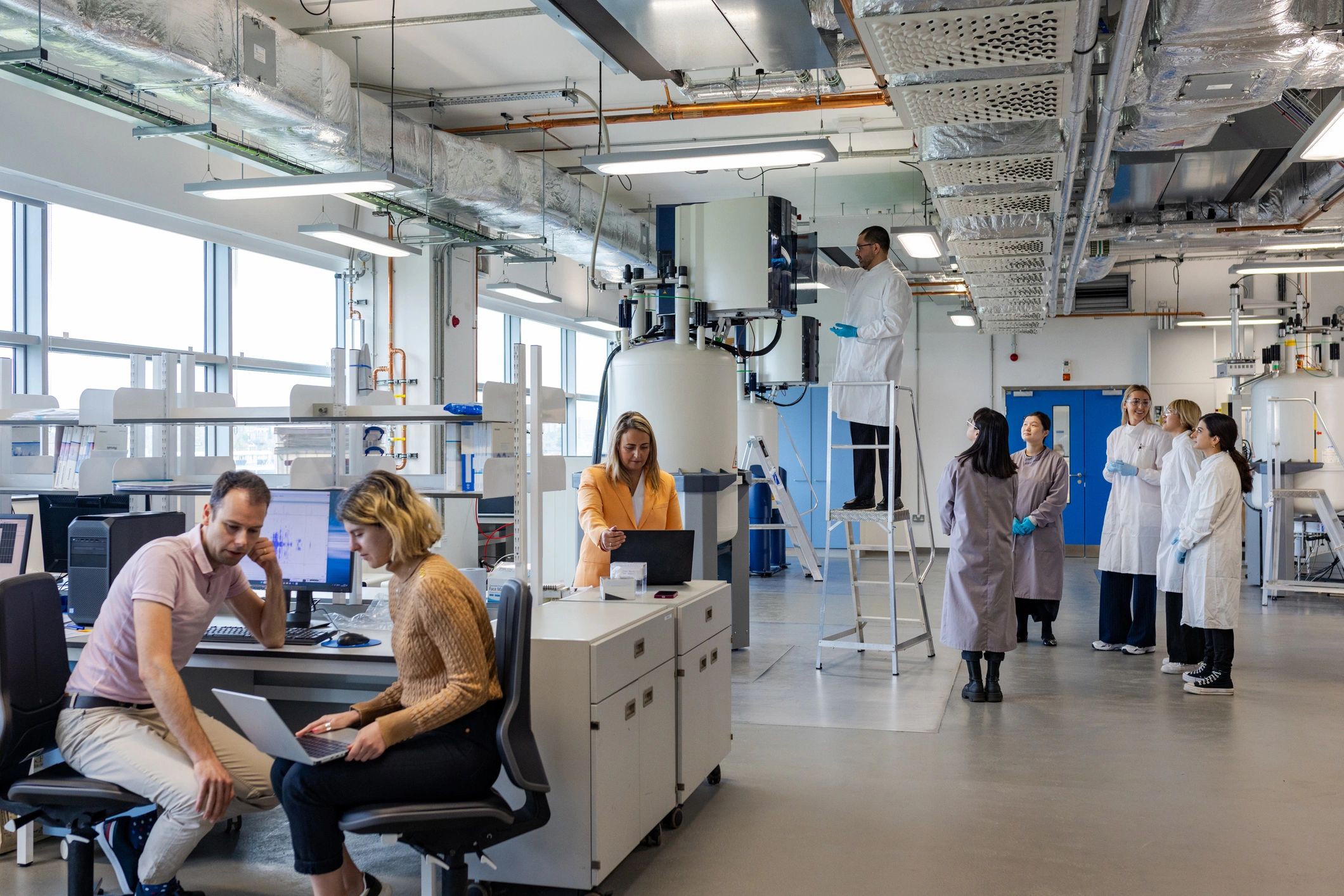 Students and instructors in a science laboratory