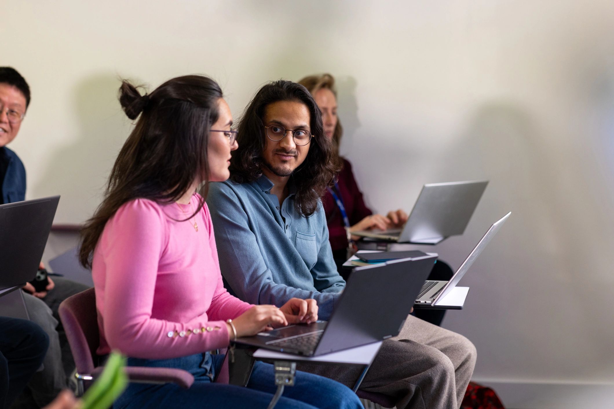 Students using laptops in a seminar